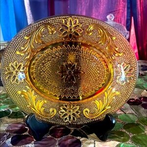 vintage Indiana Amber Glass oval plate, likely from the Tiara Sandwich pattern